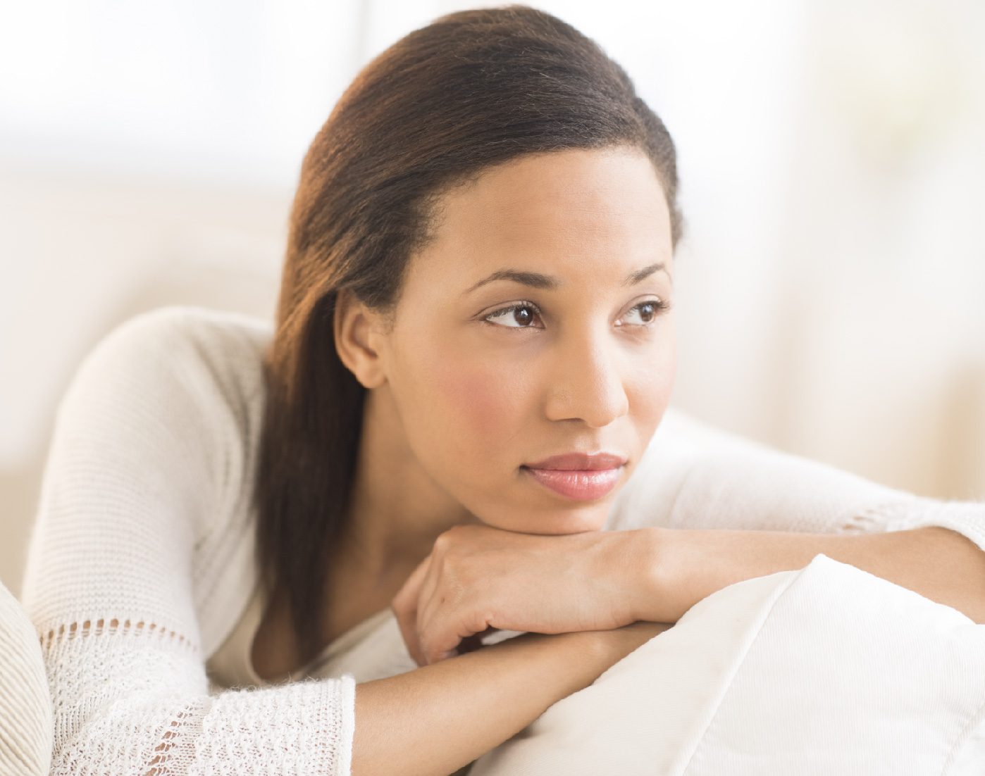 Women looking off into distance thoughtfully